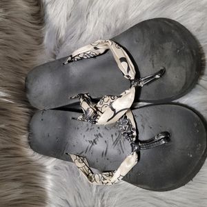 Worn woman's sandals